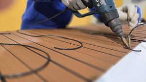 Heat welding process of Isoteak PVC teak decking panels during manufacturing